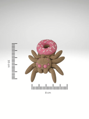 A-3D-printed-spider-figurine-with-a-donut-shaped-body-combining-playful-design-and-quirky-charm.