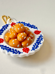 3D Printed Luqaimat Clicker Fidget Keychain – Arabic Dessert Plate Clicker with Sesame – close-up | Dubai 3D Printing