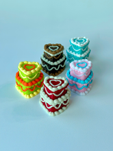 heart shaped tiered cakes with white background