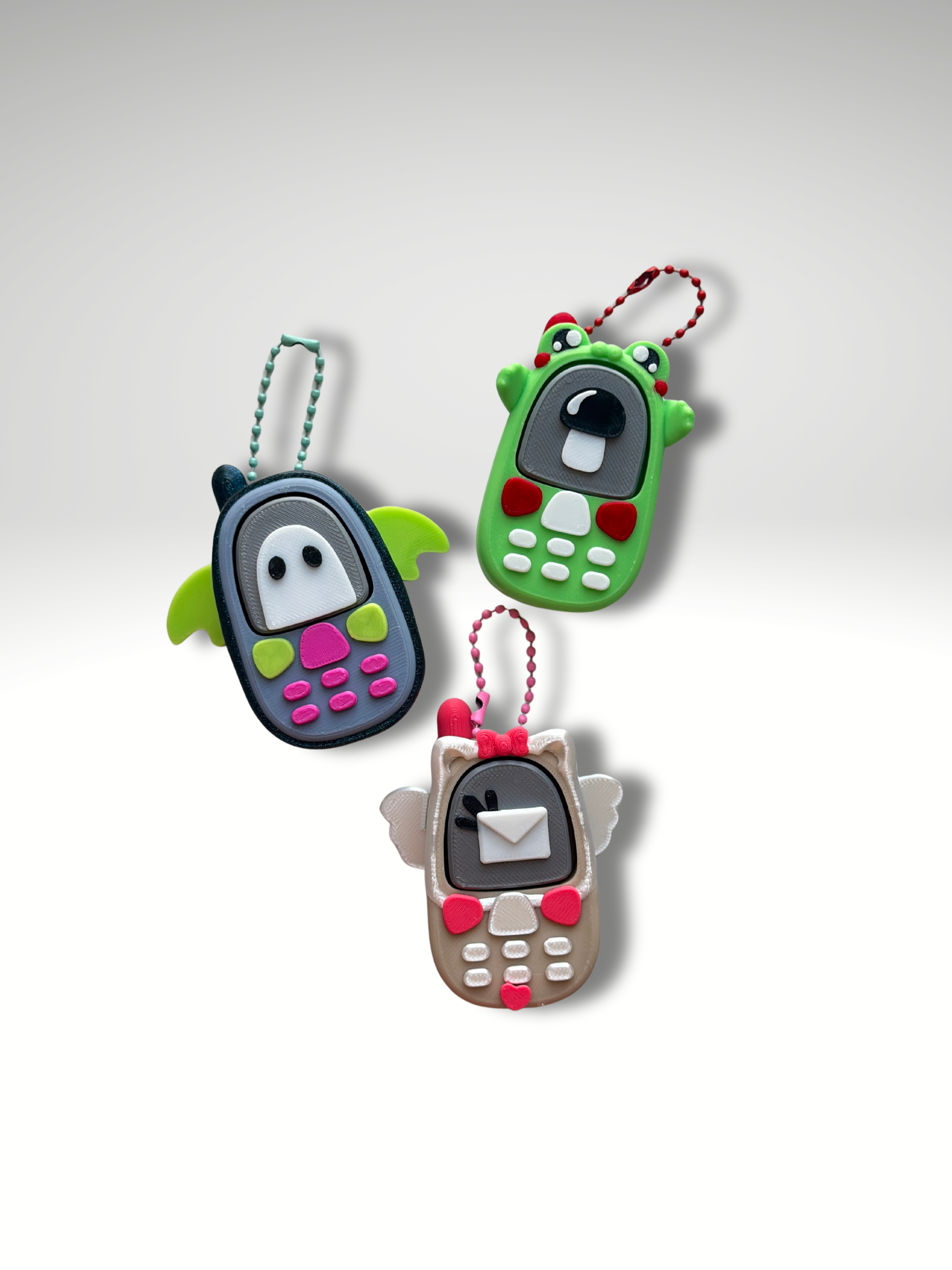 Retro Phone Clicky Pal – Bat, Cupid and Frogy 3D printed clicker fidget phone keychains | Dubai 3D Printing