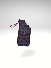 Biscuit front view of ice cream sandwich clicker, showing dot texture and clean finish