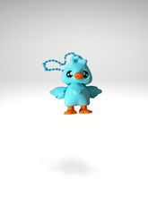 Close-up of blue 3D printed goose bag charm with orange beak and feet on a clean white background