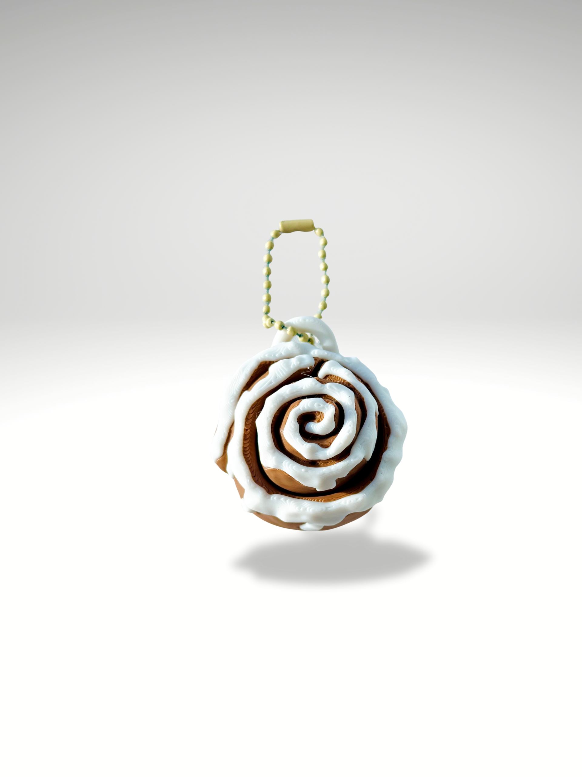 3D printed classic cinnamon roll fidget toy with frosted swirl design