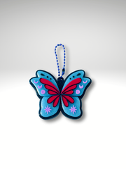 Galaxy black dark pixie fidget toy with glittery blue wings and four key switches