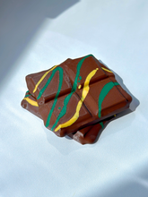 Two Dubai Chocolate Coasters placed side by side on a flat surface, highlighting the realistic 3D chocolate square look