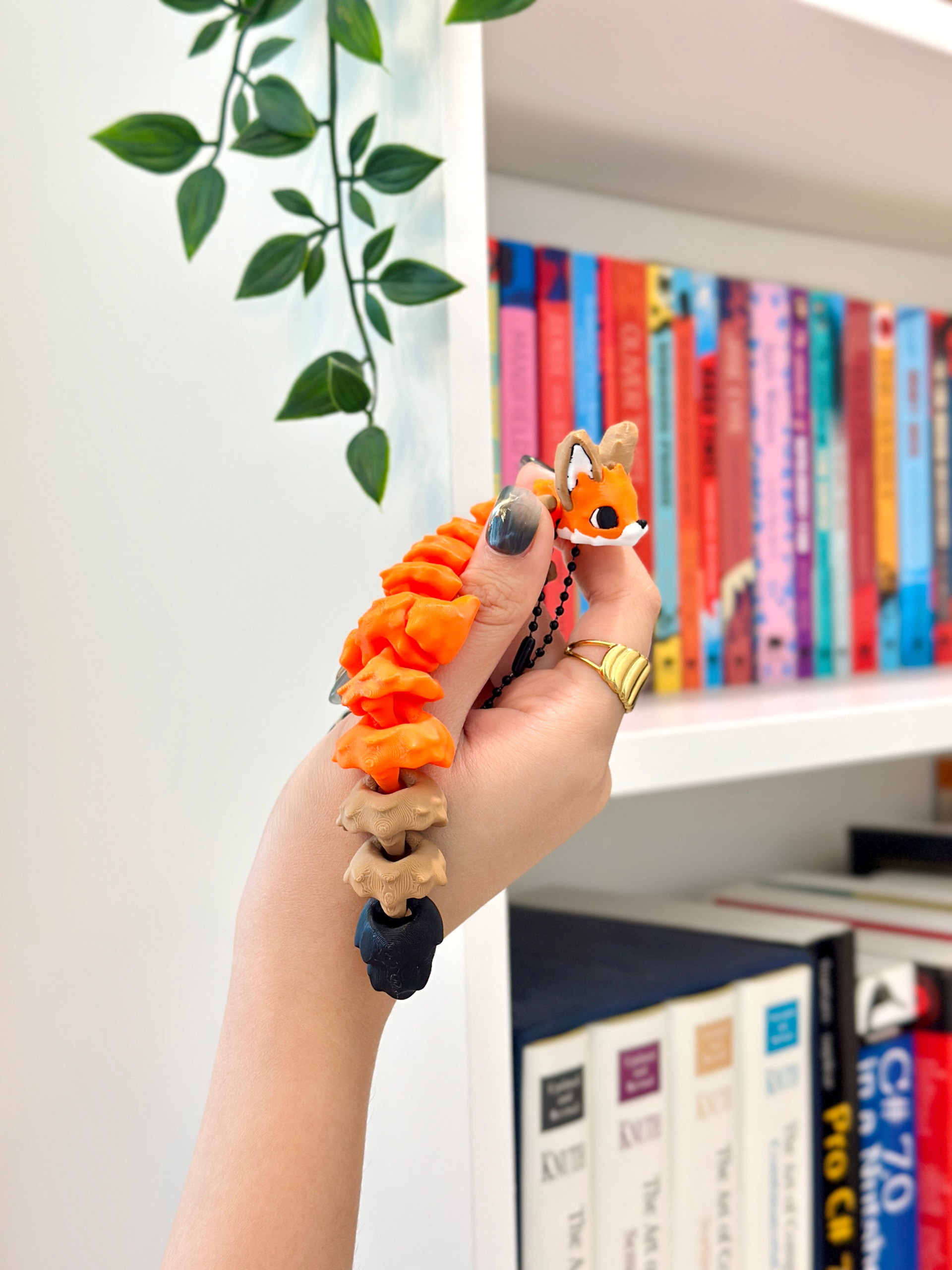 Orange, white, and black 3D printed fox bag charm keychain