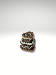 Layered brown and cream clicker styled like a vintage mocha cake on a white background.
