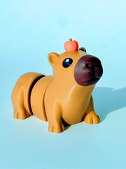 3D printed capybara figure with adjustable legs and head, posed playfully