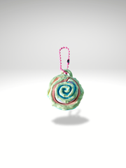 3D printed pastel pink cinnamon roll clicker with rainbow drizzle and swirl