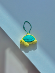 3D printed sea turtle fidget toy keychain with smooth shell and flipper details on a white background