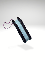 3D printed vanilla ice cream sandwich clicker showing white ice cream layer between two biscuit-textured sides, side view