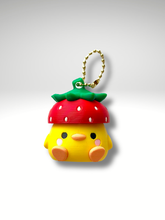 Strawberry Duck Clicky Pal keychain, a kawaii yellow duck in a red strawberry hat | Dubai 3D Printing