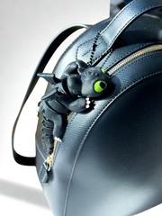Black 3D printed Toothless dragon bag charm with wings