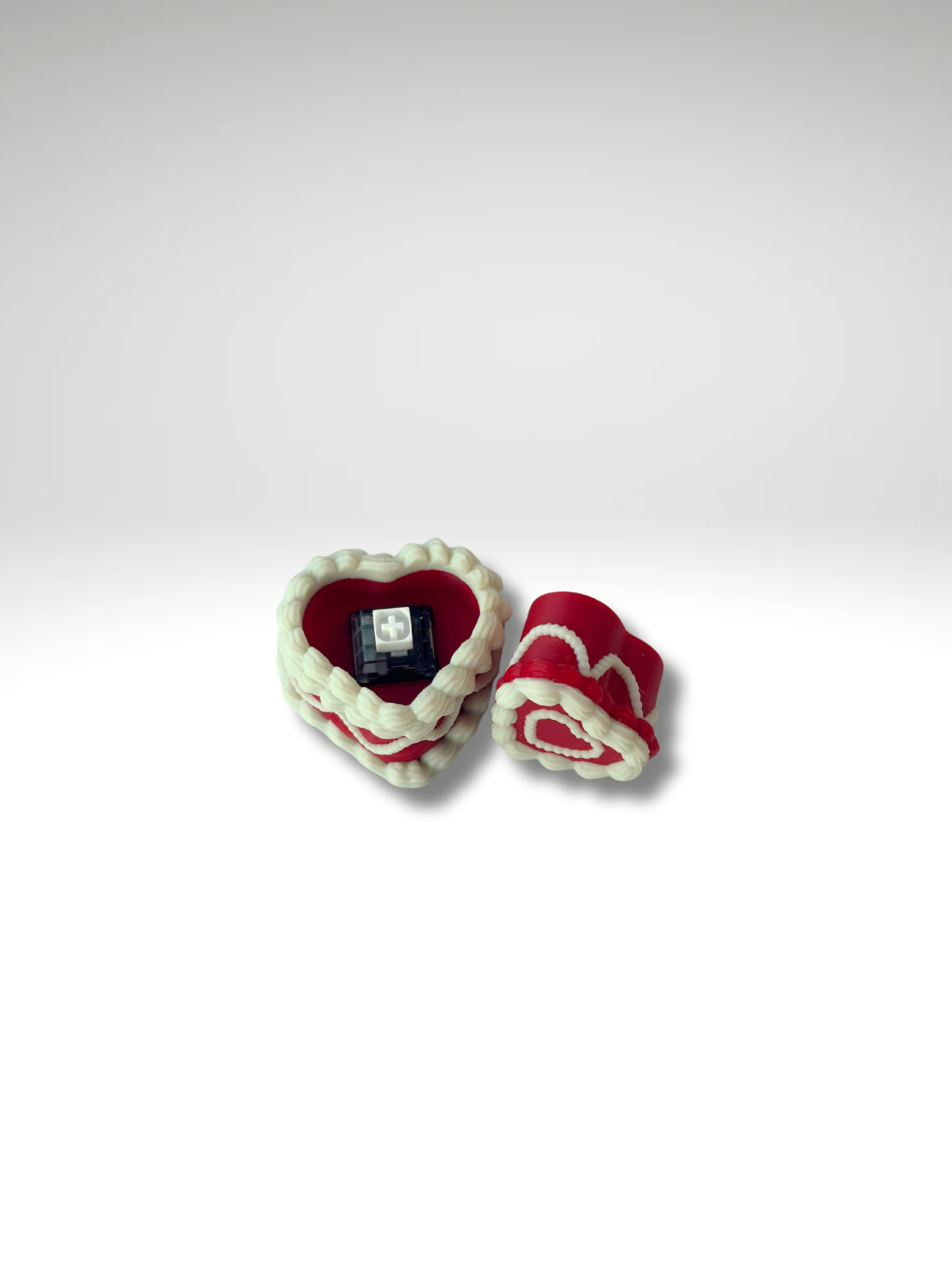 Red Velvet Heart Cake Clicker opened to show a keyboard switch