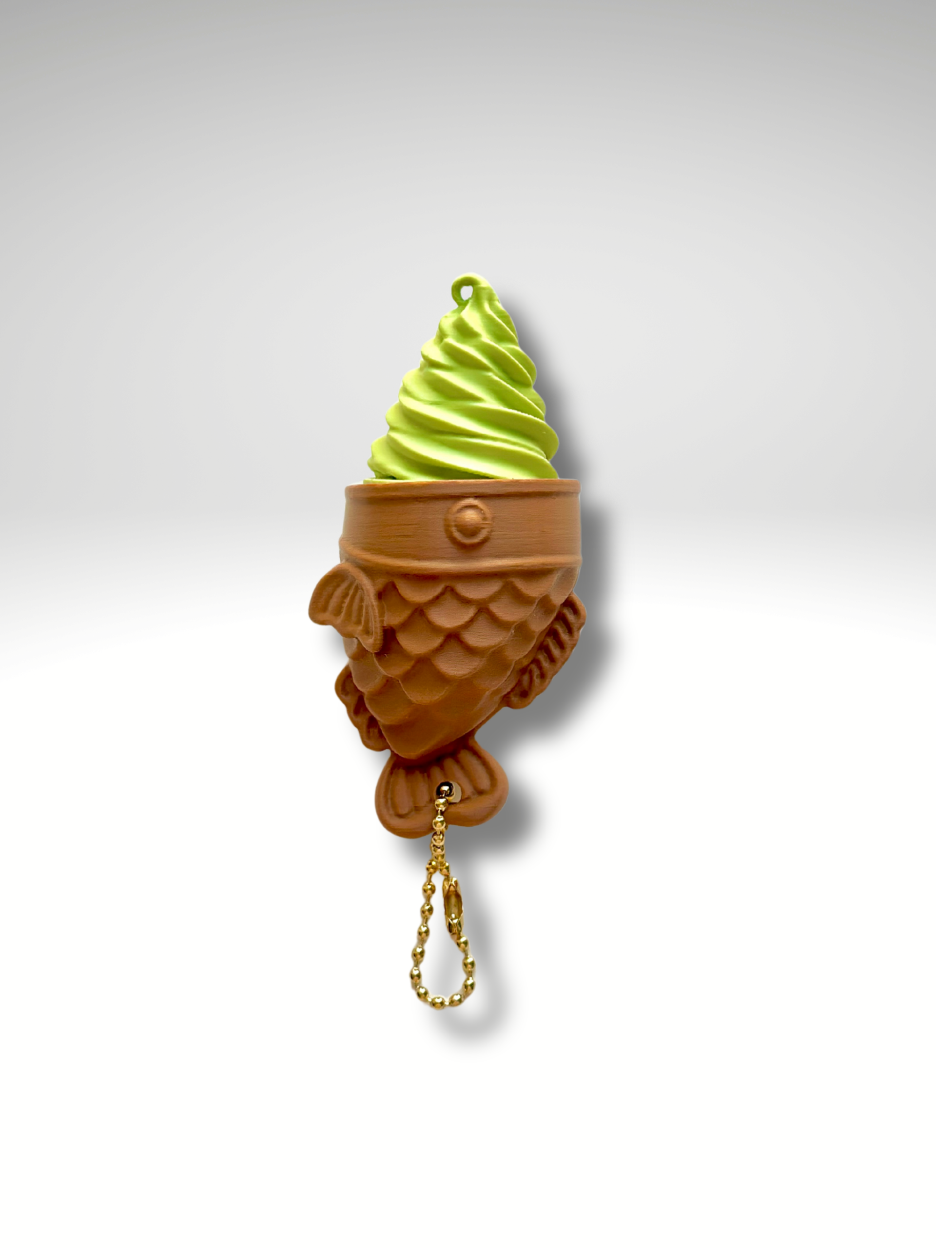 Matcha Taiyaki Clicky Pal – 3D printed Japanese fish-shaped taiyaki ice cream clicker keychain with a matcha soft-serve swirl | Dubai 3D Printing