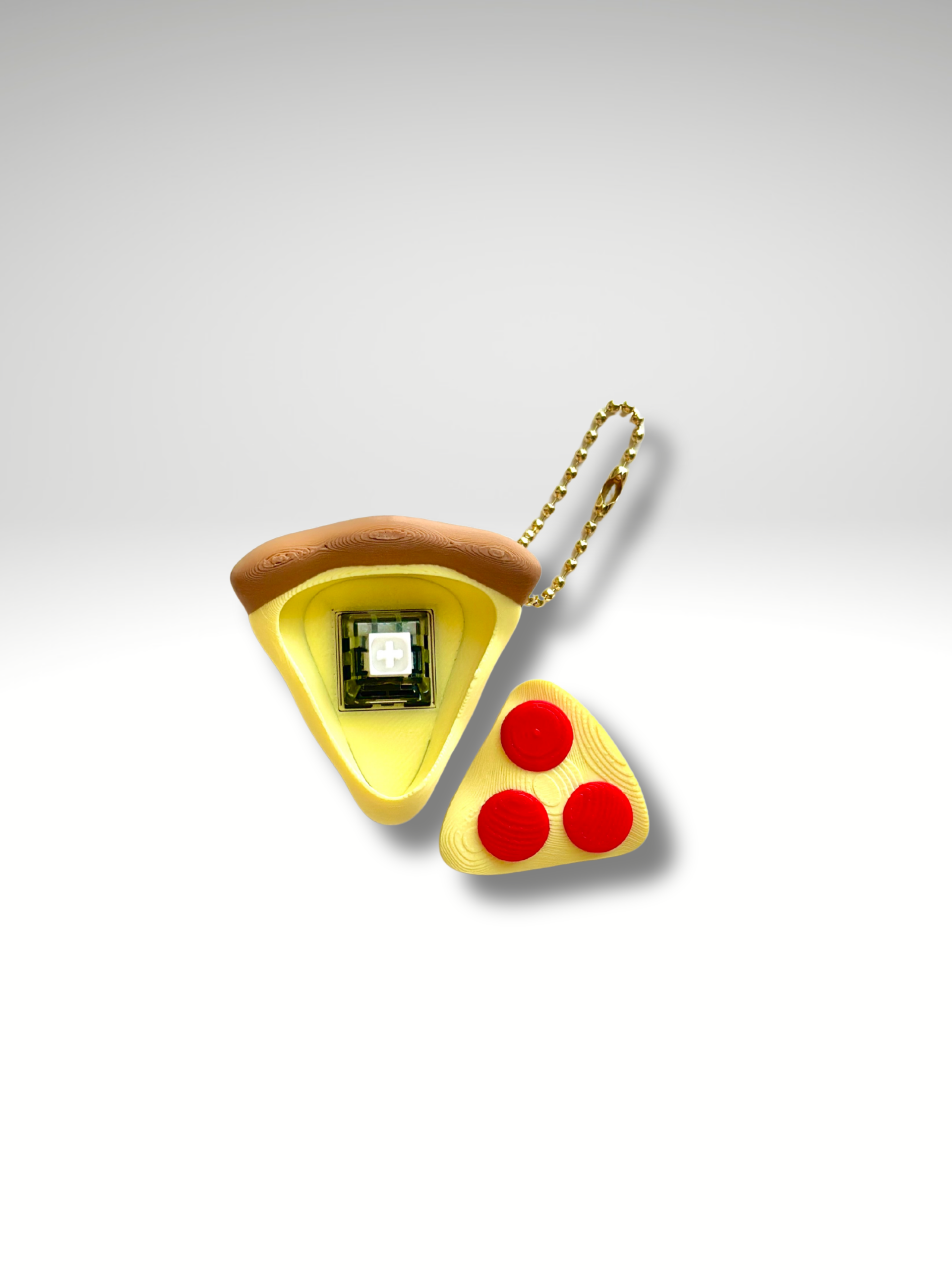 Pizza Clicky Pal with pop-off pepperoni face revealing the hidden mechanical switch | Dubai 3D Printing