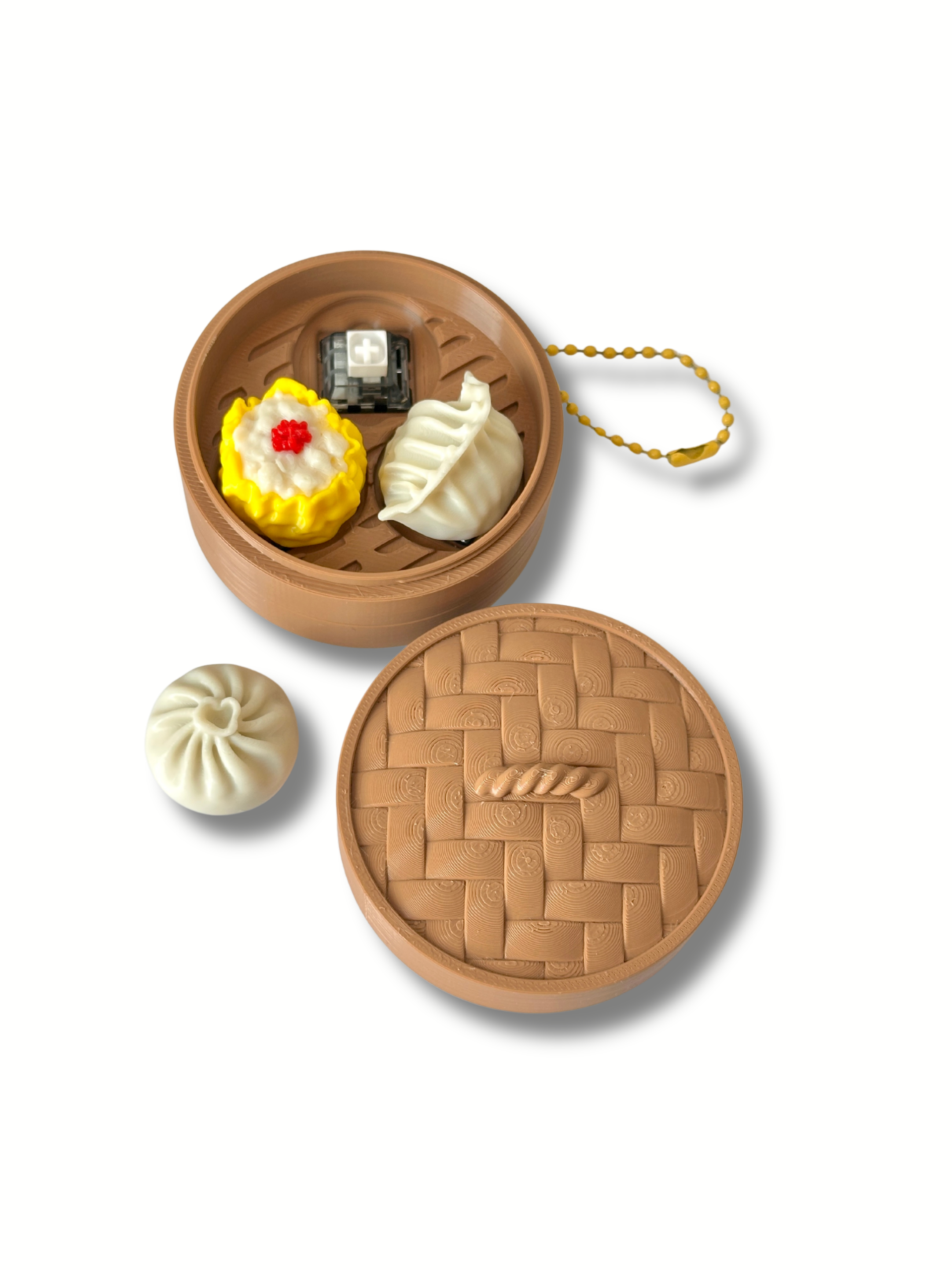 Dim sum fidget clicker set open showing mechanical switch inside bamboo basket Dubai 3D Printing
